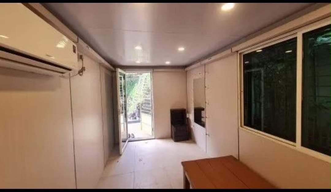 Full-length room with split AC, downlights and garden door
