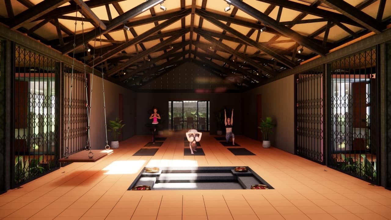 Yoga hall with exposed steel trusses and sunken water feature